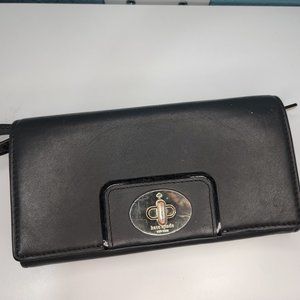 Kate spade wallet that turns into a wristlet.